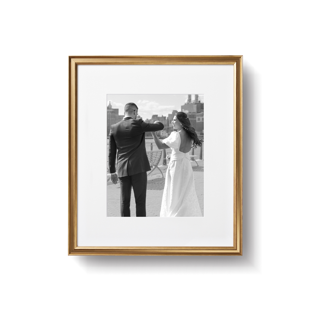 Picture of bride and groom in 14x16 gold gallery wall frame