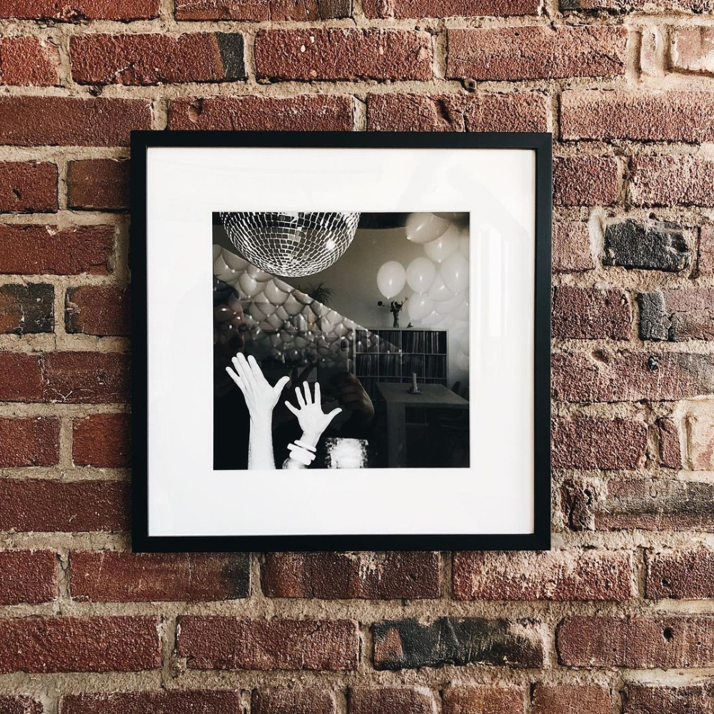 Hanging picture on brick wall deals