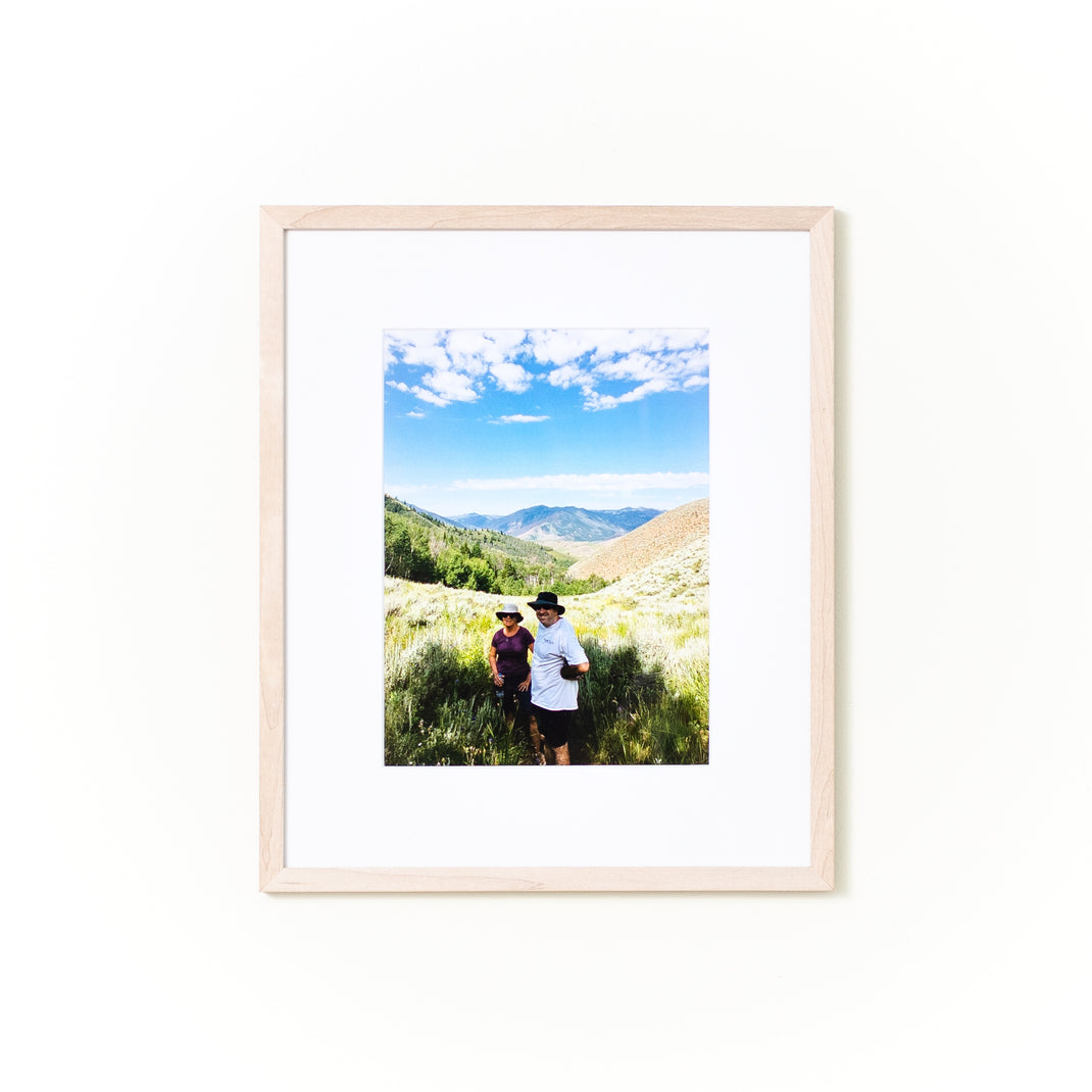 photo of a couple hiking framed in bleached maple mini