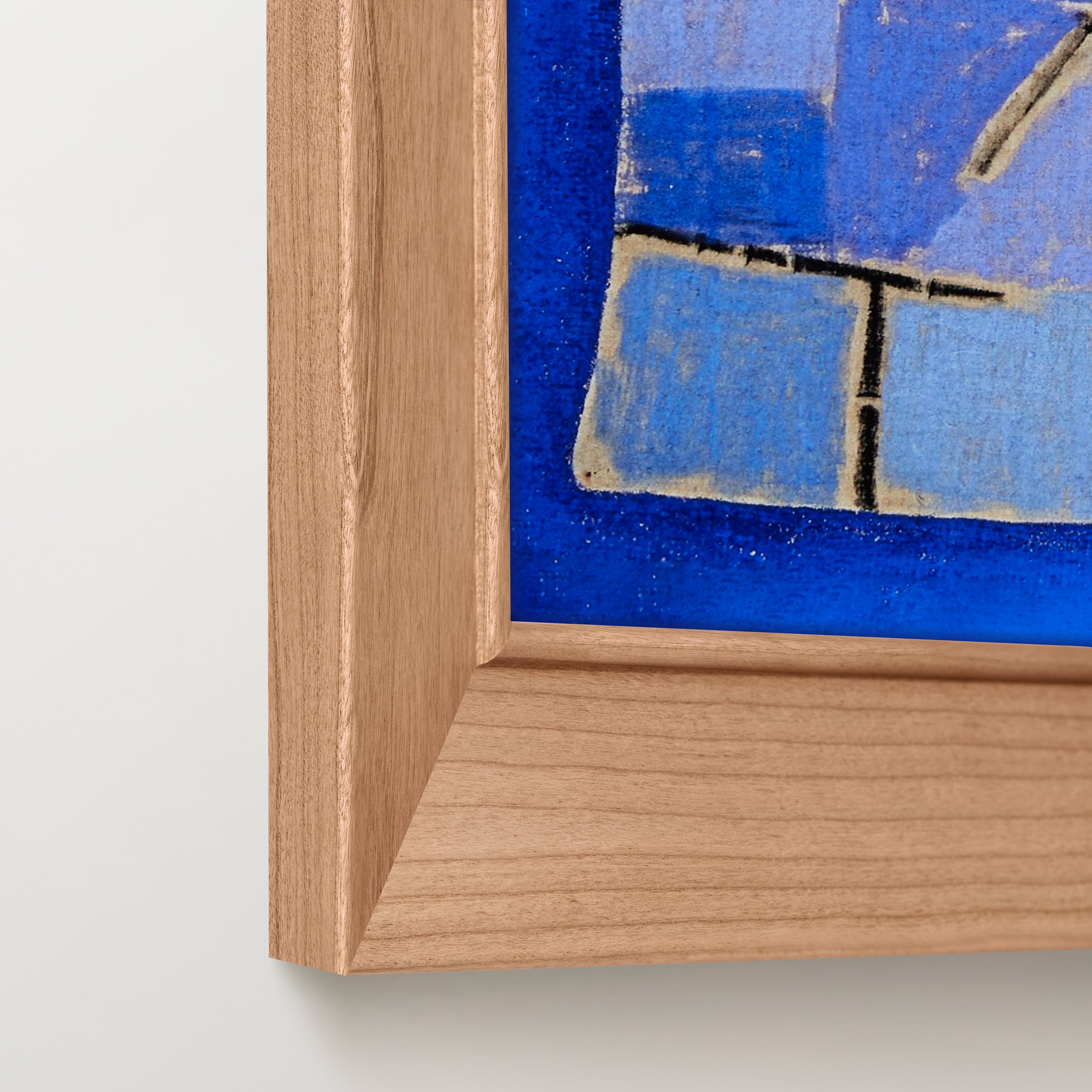 Bottom right corner of colorful blue abstract painting in a cherry angled hardwood frame