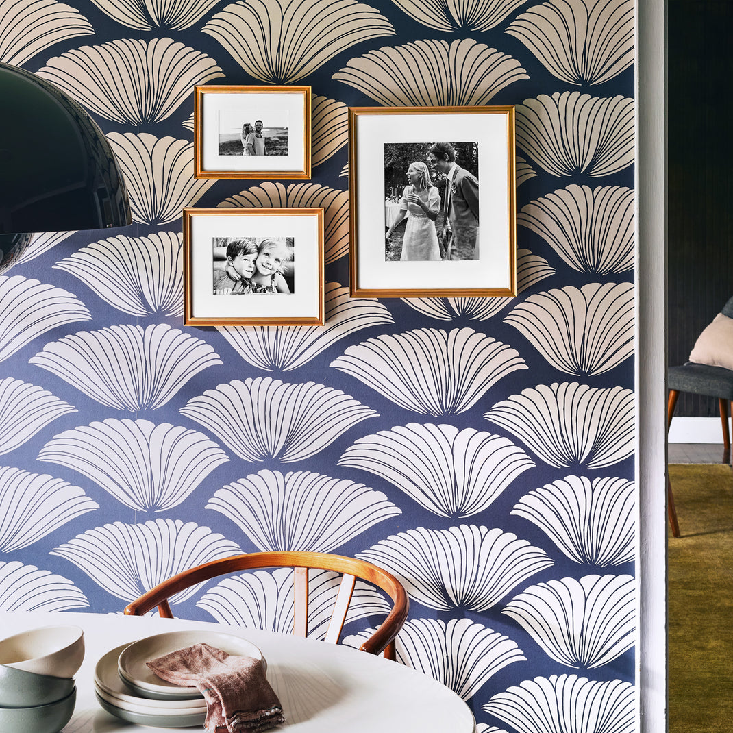 Timeless Trio gallery wall hanging on patterned blue wallpaper