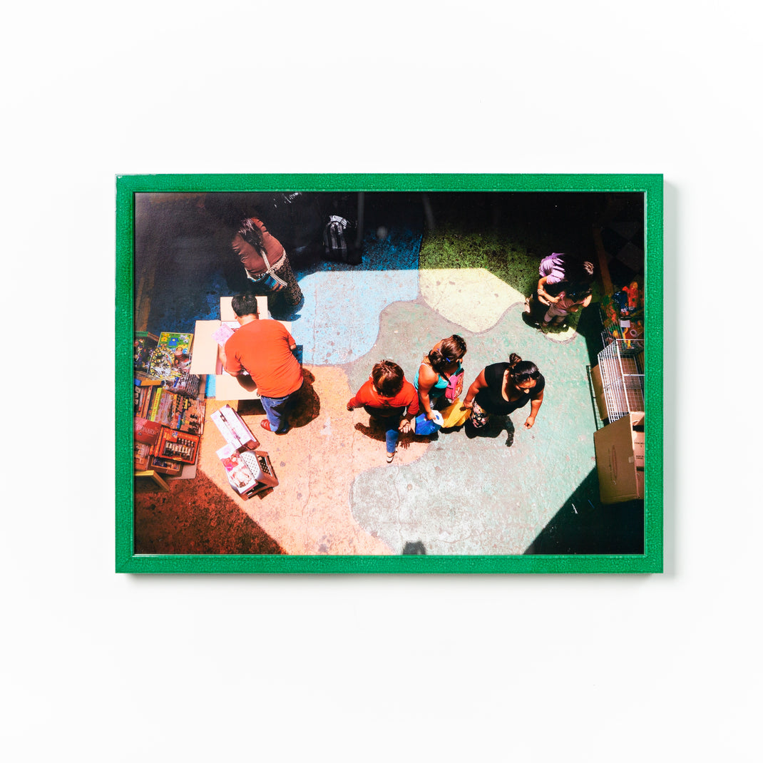 aerial photo of a group of people framed with no mat in emerald green glazed Lima frame