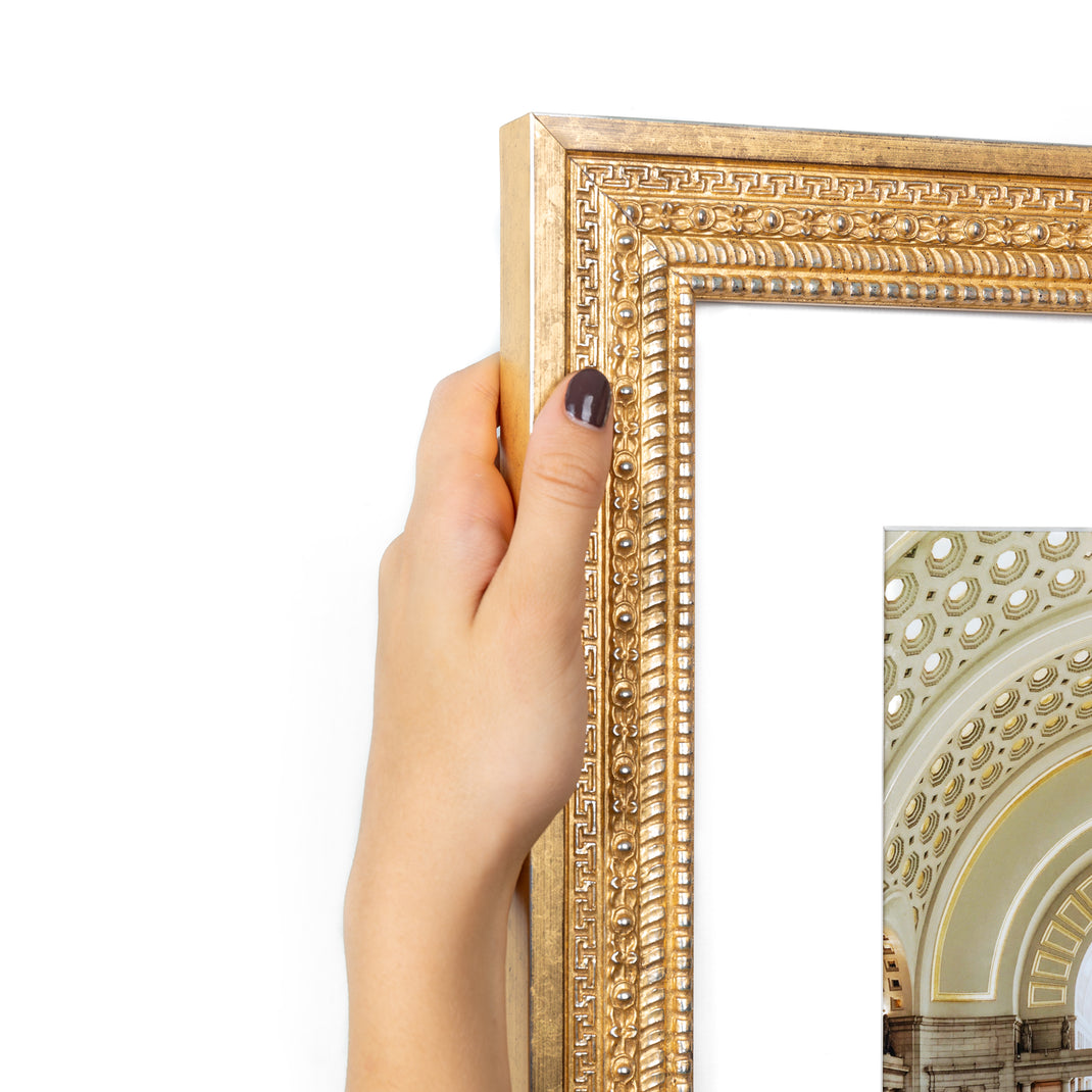 top left corner of Photo of Union Station in ornate gold Marquette frame with a white mat