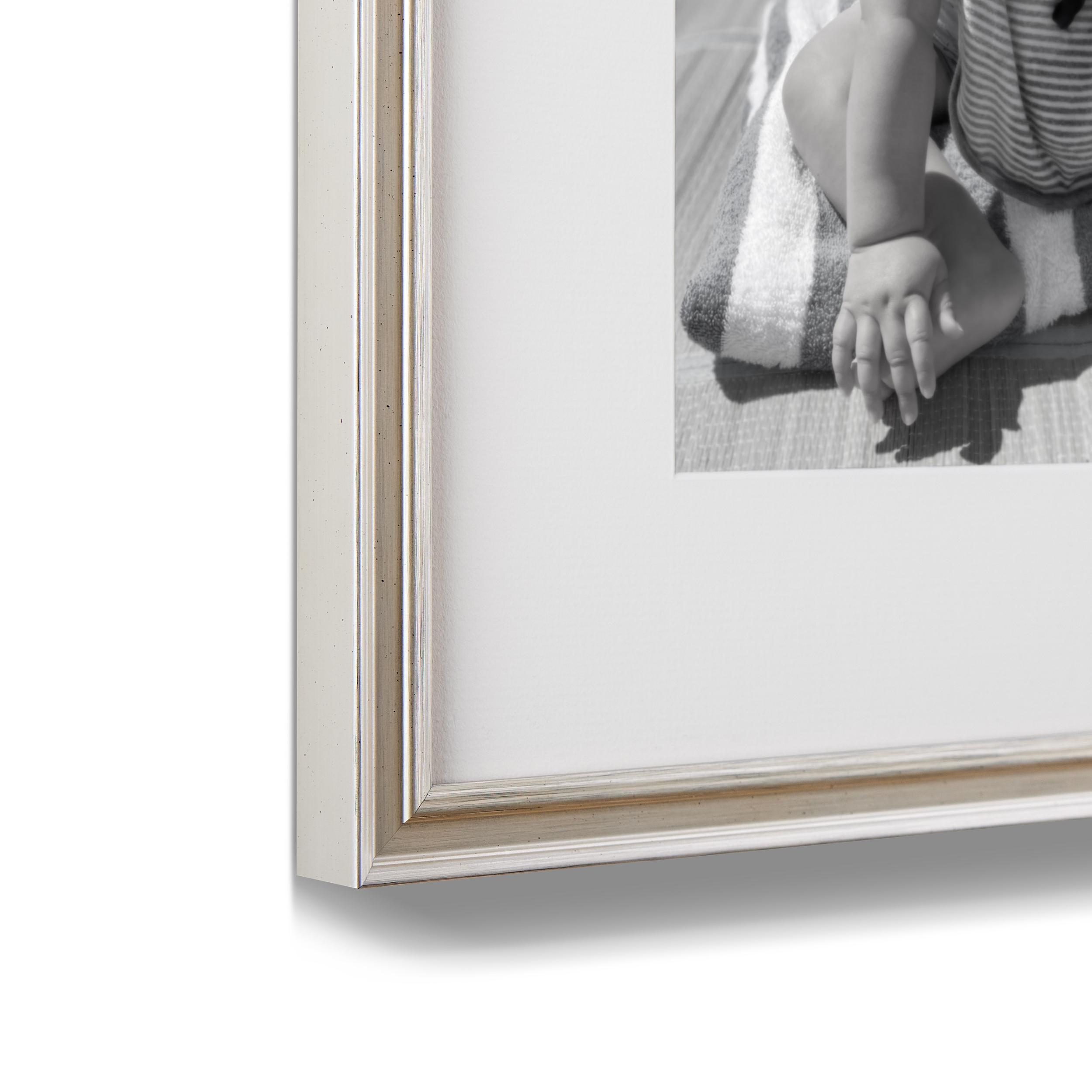 Newport: Antiqued Silver | Corner detail shot of 11x11 silver gallery wall frame