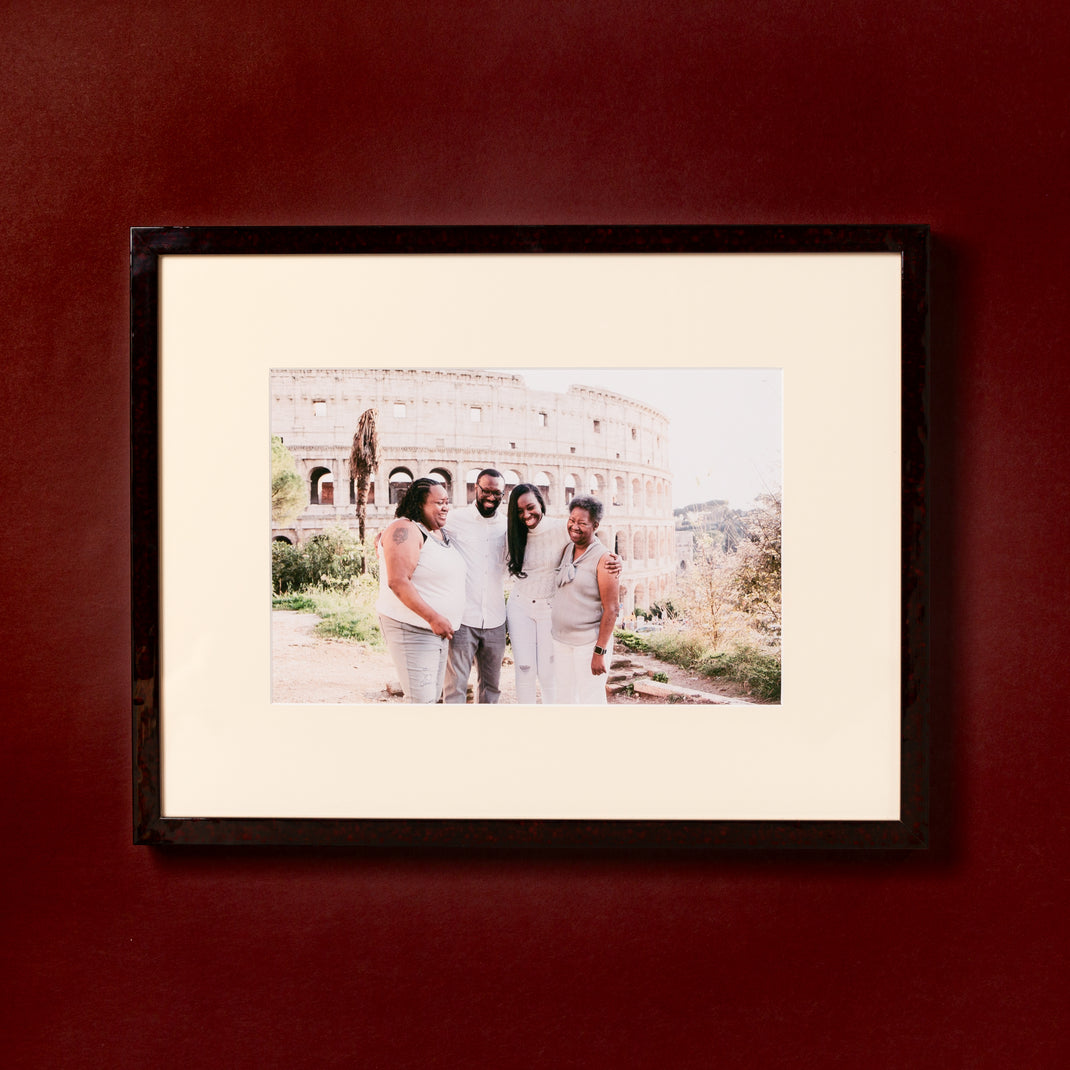 group photo in front of the Colosseum framed in deep burgundy glazed Rome frame with a white mat