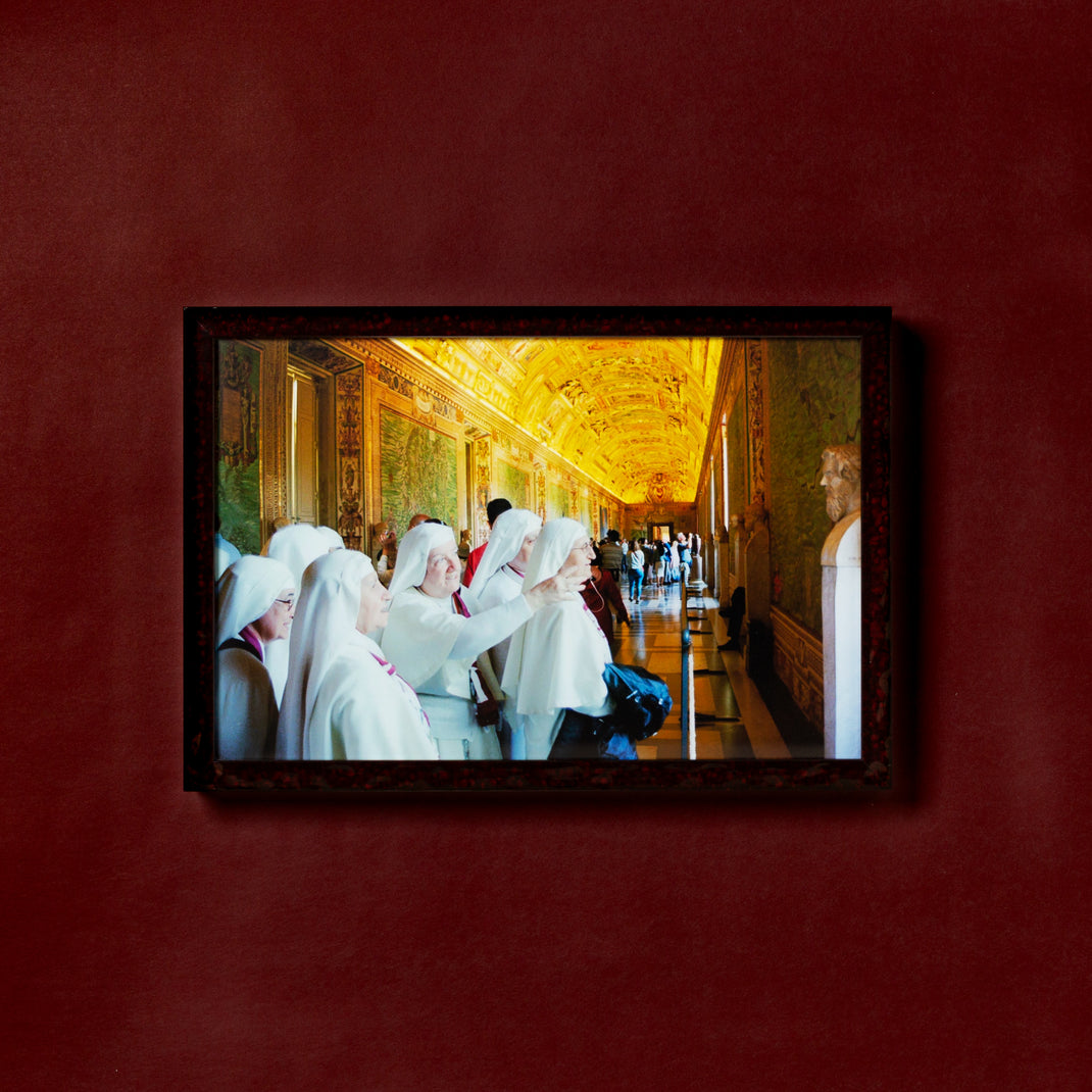 photo of nuns framed in deep burgundy glazed Rome frame