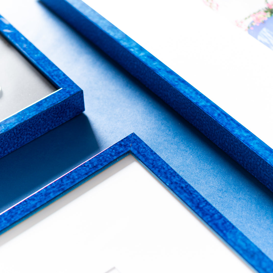 corners of royal blue glazed Santorini frames