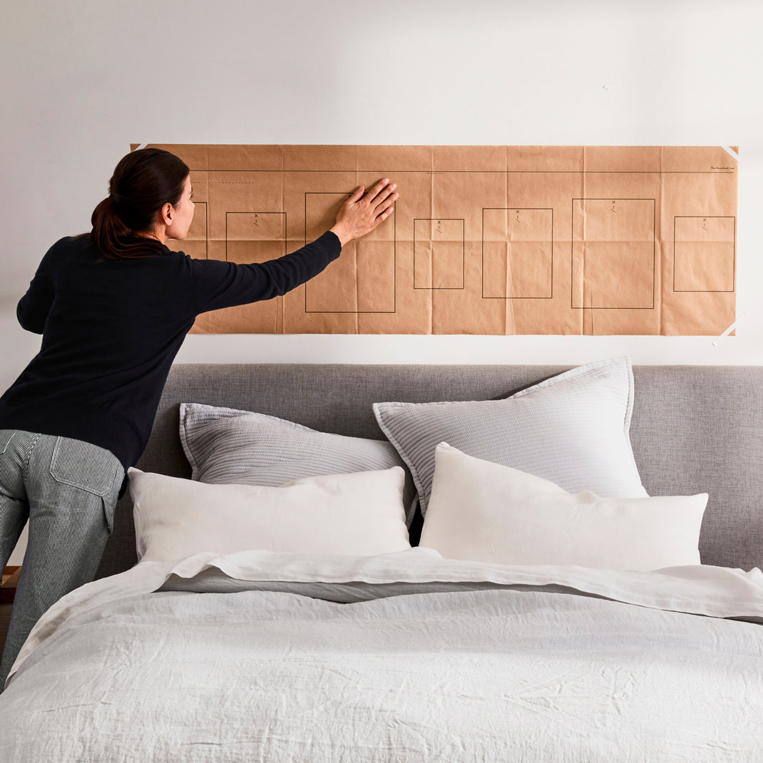 Hanging guide on wall over headboard