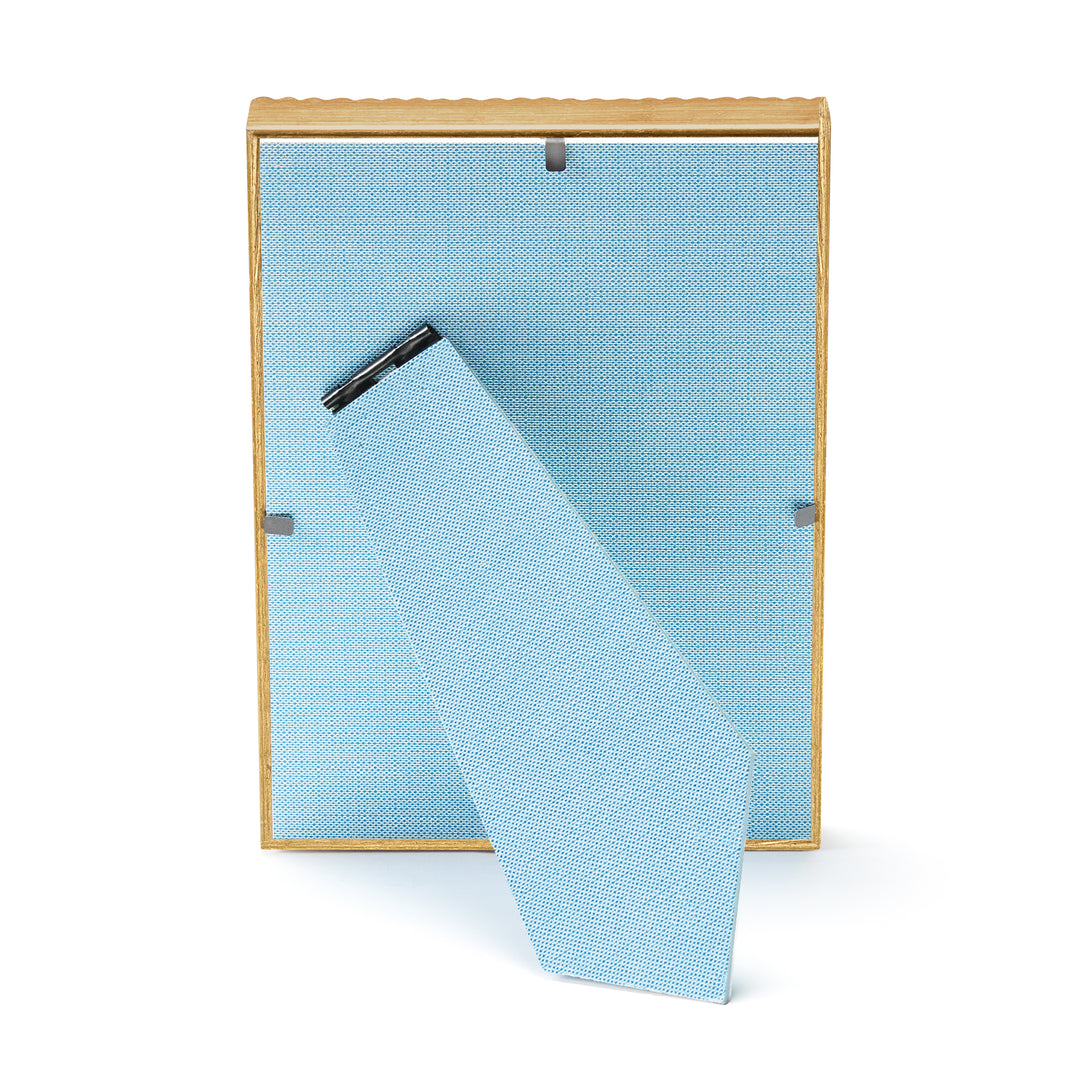 Gold frame with a puppy