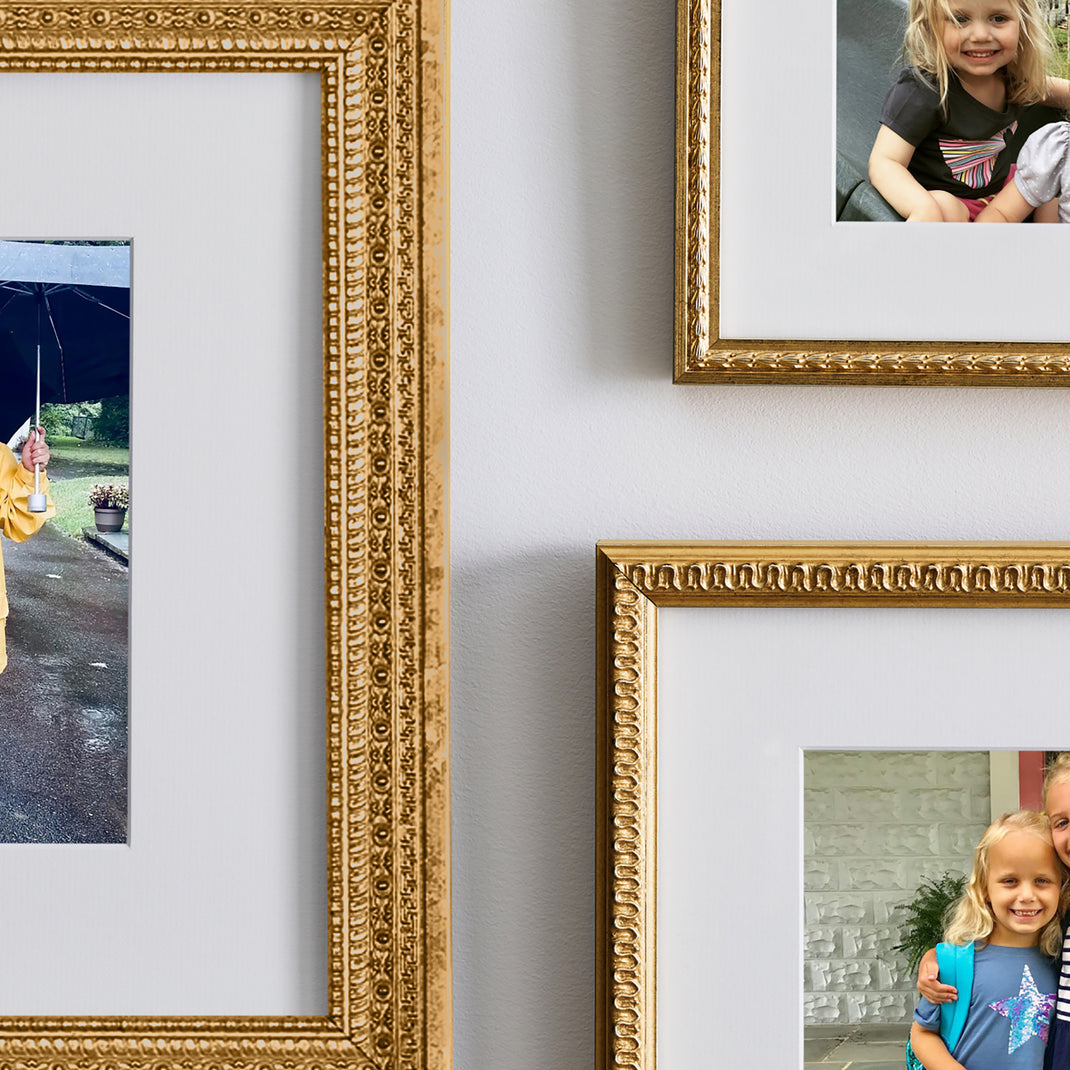 Closeup detail of three frames on a wall