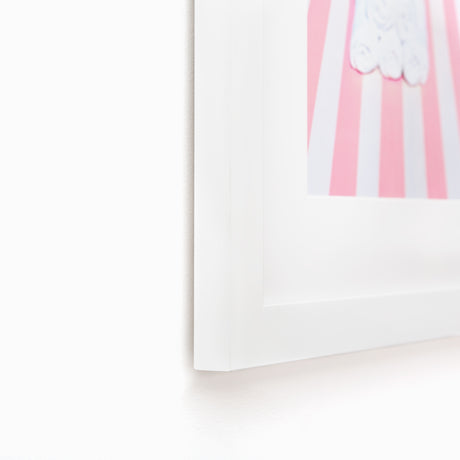 Towel art with stripes in white frame at angle